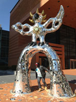 Kevin under the fire bird statue in Charlotte, NC