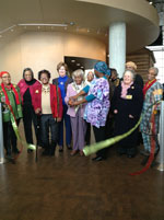 Artist, Annie Ruth, at the ribbon cutting ceremony for the Dada Rafiki: Sisters of Legacy exhibit at the NURFC in Cincinnati, OH